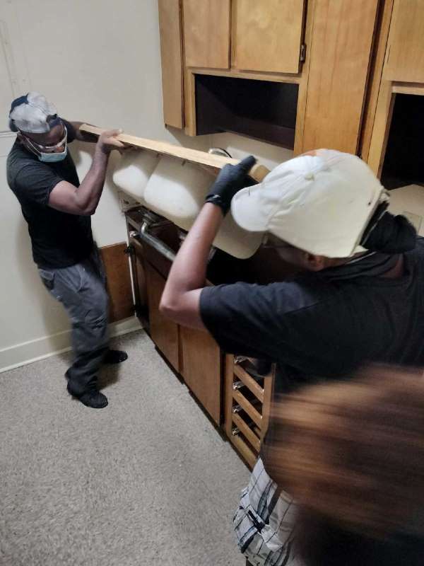 Lexi and Alseny Removing a countertop. 