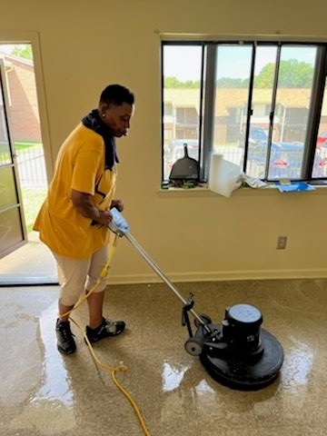 K Williams buffing the floors.