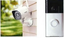 A close-up of a security camera and a ring doorbell..