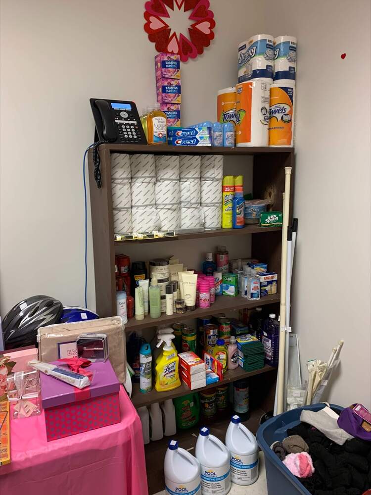 Thrift store items displayed on a shelf